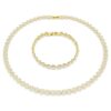 Conjunto «Una Angelic» de corte redondo, blanco, chapado en tono dorado Conjunto «Una Angelic» de corte redondo, blanco, chapado en tono dorado