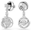 Pendientes colgantes Constella de corte redondo, piedra danzante, blancos, chapados en rodio Pendientes colgantes Constella de corte redondo, piedra danzante, blancos, chapados en rodio
