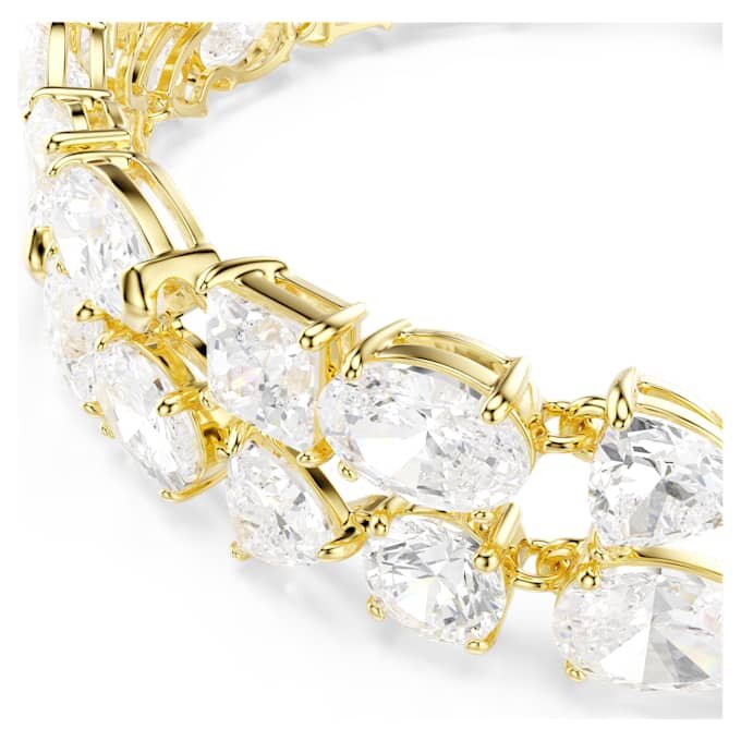 Pulseras Mesmera con cortes variados, blancas, chapadas en tono dorado Pulseras Mesmera con cortes variados, blancas, chapadas en tono dorado