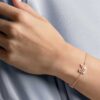 Pulseras «Swan», rosa, chapadas en tono oro rosa Pulseras «Swan», rosa, chapadas en tono oro rosa